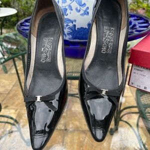 Ferragamo black pattern pumps